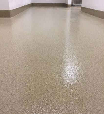 Commercial epoxy flooring detail in an active work area