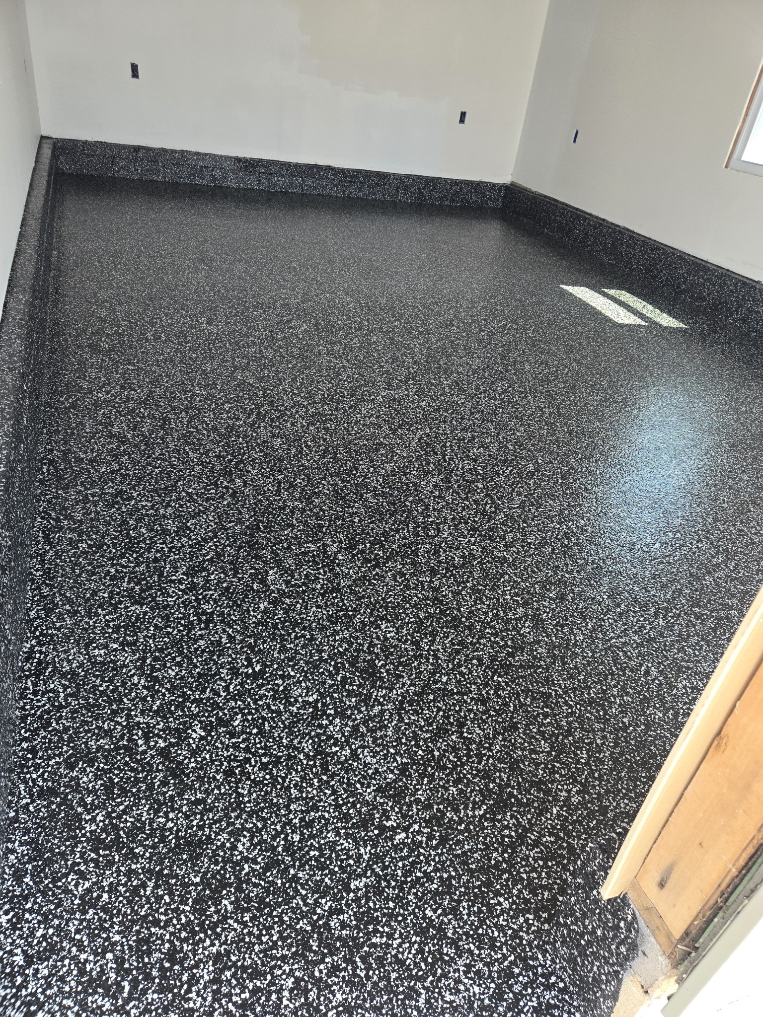 Close-up detail of premium decorative flake flooring texture