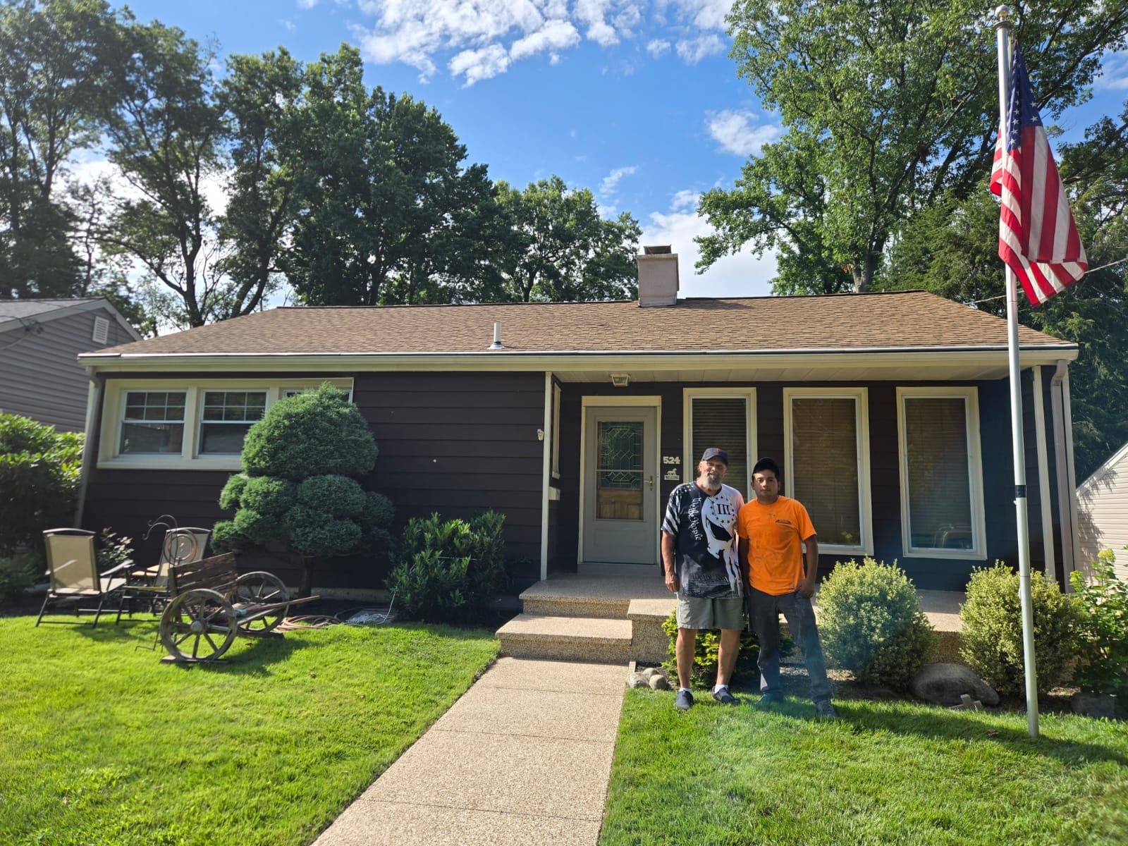 Den Tram standing in front of a home in Ewing, New Jersey